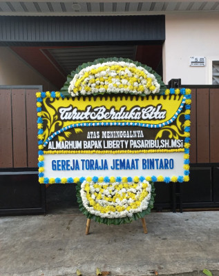 Papan Bunga Duka di Tanjung Marulak